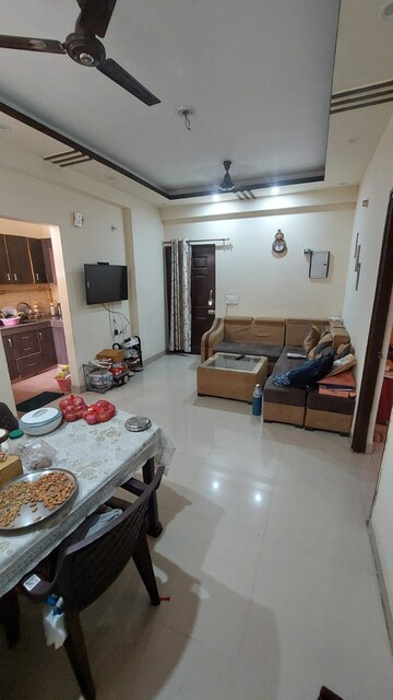 Living Room in 2 BHK Apartment at Charms Castle, Raj Nagar Extension – for Rent