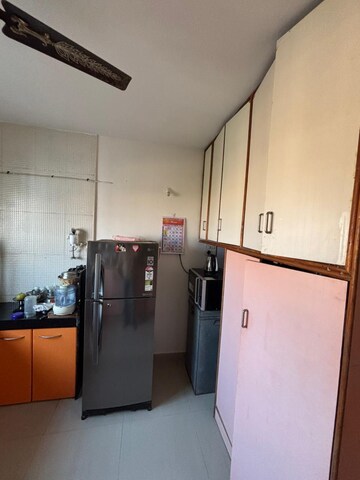 Kitchen in 2 BHK Apartment at Borate Jijai Nagari, Kothrud – for Rent