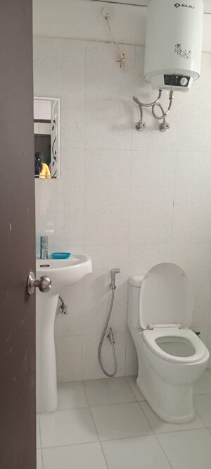 Bathroom in 2.5 BHK Apartment at Urban Axis Urban Woods, Sushant Golf City – for Rent