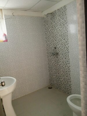 Bathroom in 2.5 BHK Apartment at Urban Axis Urban Woods, Sushant Golf City – for Rent