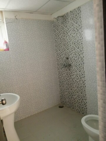 Bathroom in 2.5 BHK Apartment at Urban Axis Urban Woods, Sushant Golf City – for Rent