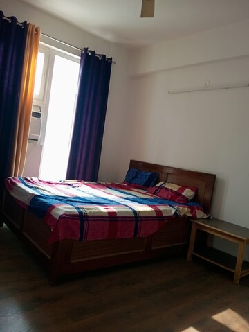 Bedroom in 2.5 BHK Apartment at Urban Axis Urban Woods, Sushant Golf City – for Rent