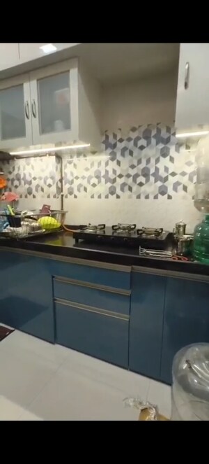 Kitchen in 1 BHK Apartment at Raunak Unnathi Woods, Ghodbunder Road – for Rent