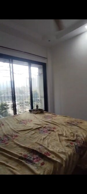 Bedroom in 1 BHK Apartment at Green Acres Apartment, Waghbil – for Rent