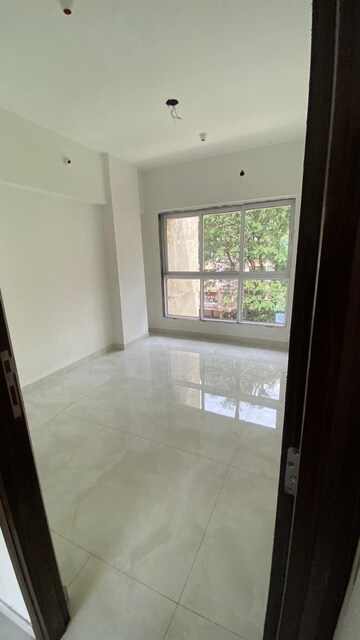 Room in 2 BHK Apartment at Atul Blue Empire, Kandivali West – for Sale