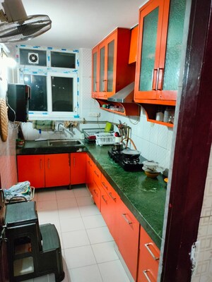 Kitchen in 2.5 BHK Apartment at Pawitra Cooperative Society, Vasundhara Enclave – for Rent