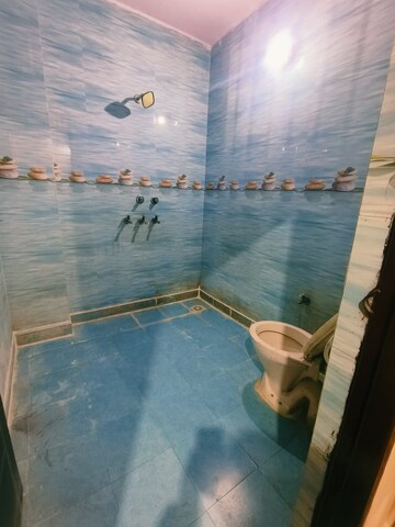 Bathroom in 1.5 BHK Builder Floor at Dwarka Mor – for Rent
