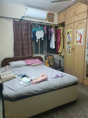 Bedroom in 1 BHK Apartment at Mandakini CHS, Dahisar East – for Rent