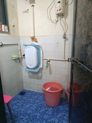 Bathroom in 1 BHK Apartment at Mandakini CHS, Dahisar East – for Rent