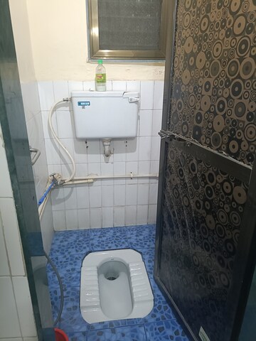 Bathroom in 1 BHK Apartment at Mandakini CHS, Dahisar East – for Rent