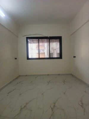 Bedroom in 1 BHK Apartment at Prime CHS, Mulund East – for Sale