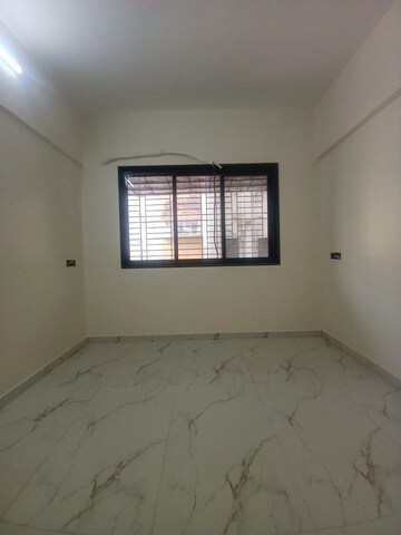 Bedroom in 1 BHK Apartment at Prime CHS, Mulund East – for Sale