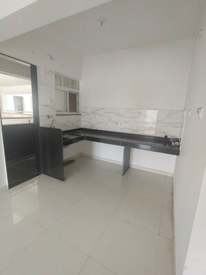 Kitchen in 1 BHK Apartment at Dynamic Grandeur, Undri – for Sale