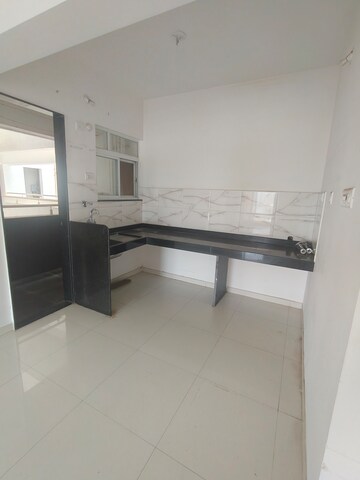 Kitchen in 1 BHK Apartment at Dynamic Grandeur, Undri – for Sale