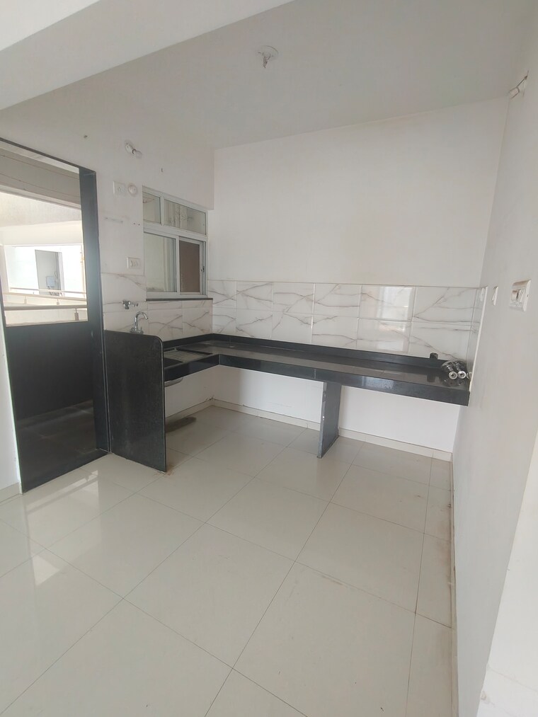 Kitchen, dynamic-grandeur 1 Bedroom 403 Sq.Ft. Apartment In Undri Pune 9674138