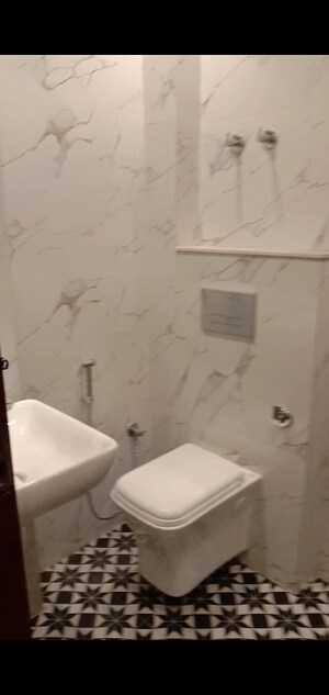 Bathroom in 3 BHK Builder Floor at Mahavir Enclave – for Sale