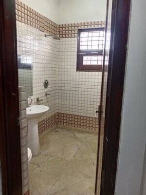Bathroom in 4 BHK Builder Floor at Ansals Sushant City – for Rent