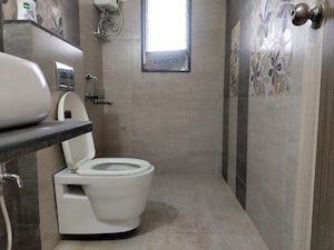 Bathroom in 3 BHK Apartment at Jangid Galaxy, Ghodbunder Road – for Rent