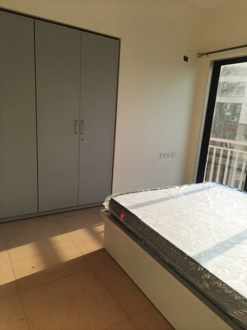 Bedroom in 3.5 BHK Apartment at Harmony Signature Towers, Owale – for Rent