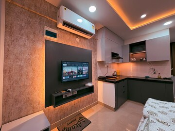 Living Room in Studio Apartment at Okay Plus Solitaire Suites, Ramnagariya – for Rent