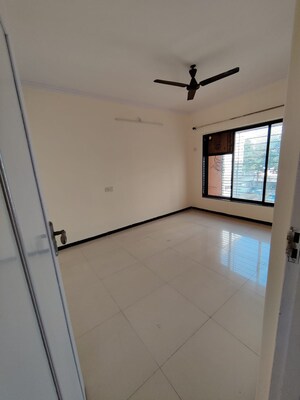 Room in 1 BHK Apartment at Satellite Garden, Goregaon East – for Rent