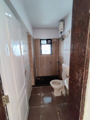 Bathroom in 1 BHK Apartment at Satellite Garden, Goregaon East – for Rent
