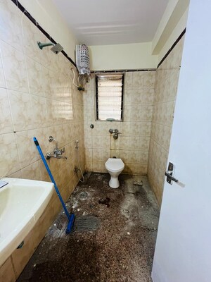 Bathroom in 2 BHK Apartment at Satellite Garden, Goregaon East – for Rent