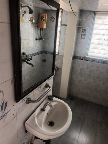 Bathroom in 1 BHK Apartment at Asmita Jyoti CHS, Malad West – for Rent