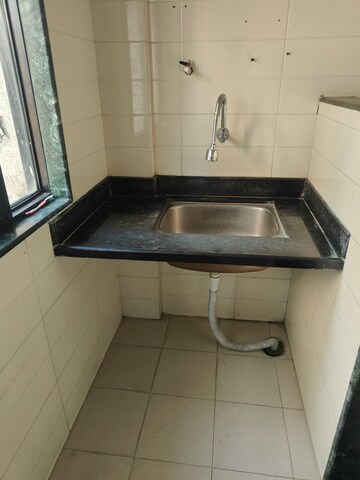 Kitchen in 2 BHK Apartment at Parmar Santoor, Wakad – for Rent