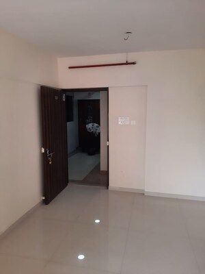 Room in 1 BHK Apartment at Dharti Pressidio, Kandivali West – for Sale