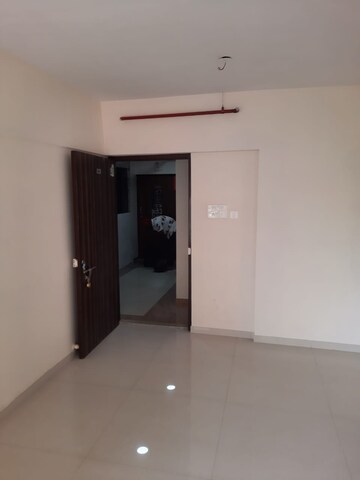 Room in 1 BHK Apartment at Dharti Pressidio, Kandivali West – for Sale
