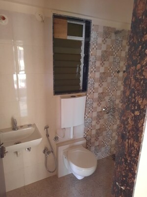 Bathroom in 1 BHK Apartment at Dharti Pressidio, Kandivali West – for Sale