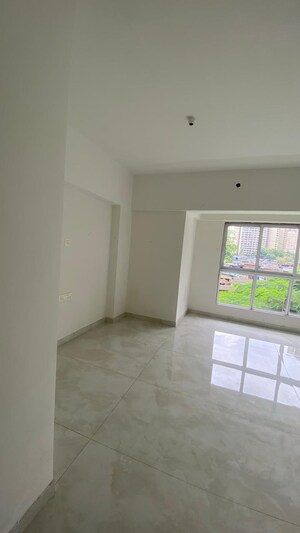 Room in 2 BHK Apartment at Atul Blue Empire, Kandivali West – for Sale