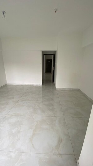 Room in 2 BHK Apartment at Atul Blue Empire, Kandivali West – for Sale