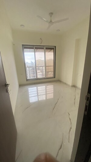 Room in 2 BHK Apartment at Atul Blue Empire, Kandivali West – for Sale
