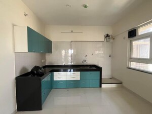 Kitchen in 2 BHK Apartment at Nyati Elysia, Kharadi – for Rent