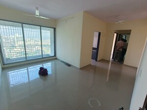 Room in 2 BHK Apartment at Shubh Om Rudra Heights, Karanjade – for Rent