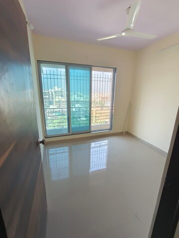 Room in 2 BHK Apartment at Shubh Om Rudra Heights, Karanjade – for Rent