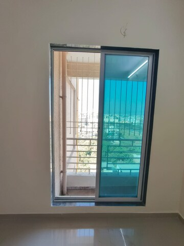 Room in 2 BHK Apartment at Shubh Om Rudra Heights, Karanjade – for Rent