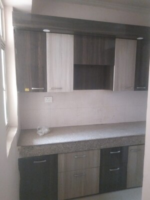 Kitchen in 2 BHK Apartment at Ajnara Homes, Sector 16b Greater Noida – for Rent