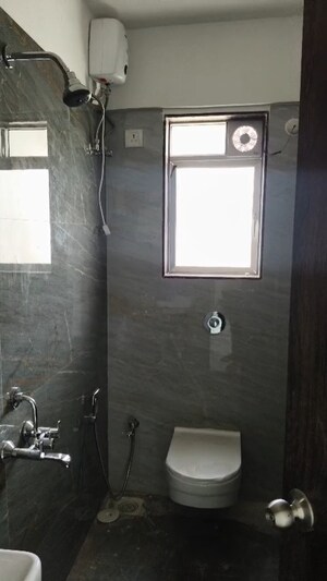 Bathroom in 2 BHK Apartment at Dharmesh Sumukh Plaza, Dadar West – for Rent