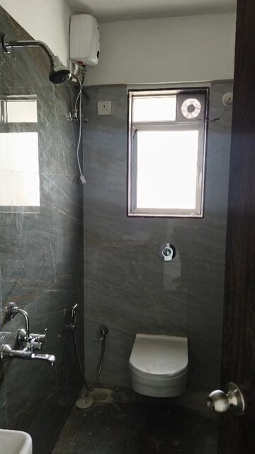 Bathroom in 2 BHK Apartment at Dharmesh Sumukh Plaza, Dadar West – for Rent