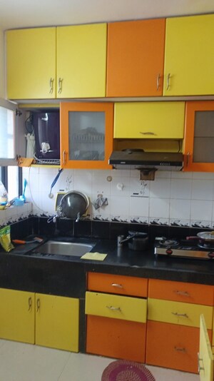 Kitchen in 2 BHK Apartment at Spring Dales, Kharadi – for Rent
