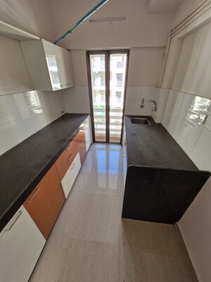 Kitchen in 2 BHK Apartment at Ekta Brooklyn Park, Virar West – for Sale