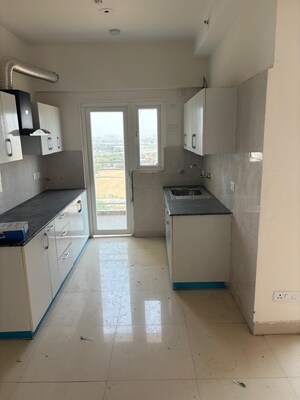 Kitchen in 2.5 BHK Apartment at Samridhi Luxuriya Avenue, Sector 150 – for Rent
