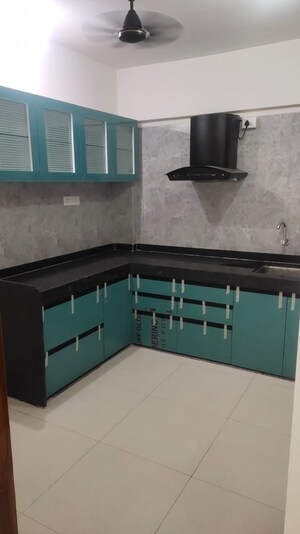 Kitchen in 2 BHK Apartment at Gini Belvista Phase 1, Dhanori – for Rent