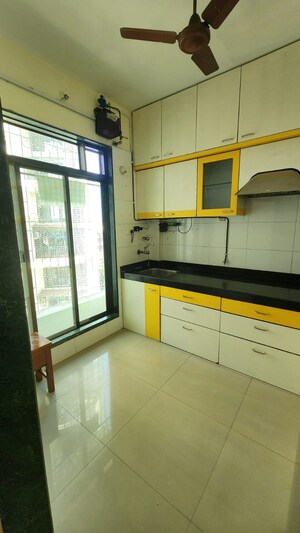 Kitchen in 2 BHK Apartment at Torna CHS Nerul, Nerul Sector 27 – for Rent
