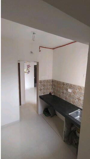 Kitchen in 1 BHK Apartment at Dosti Greater Thane, Kalher – for Rent