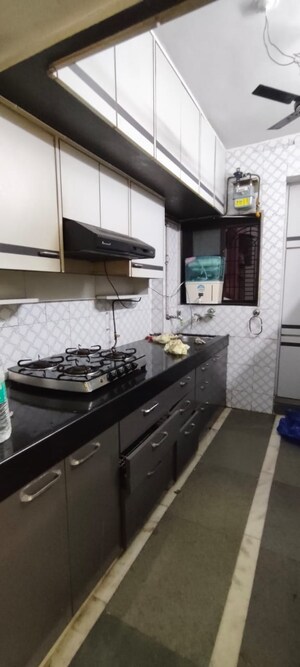 Kitchen in 2 BHK Apartment at Rutu Park Majiwada, Thane West – for Rent