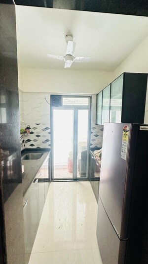 Kitchen in 1 BHK Apartment at Rosa Elite, Bhayandarpada – for Sale